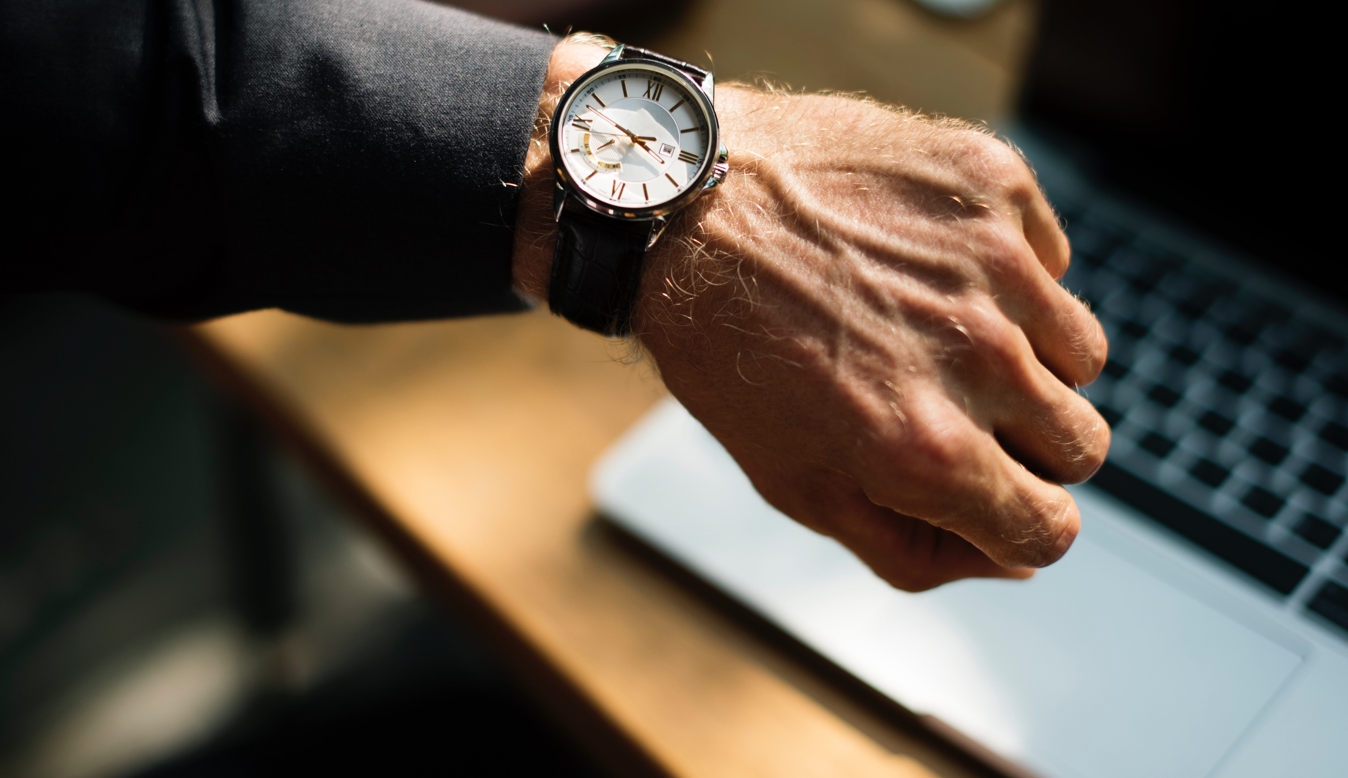 Hand with a wrist watch