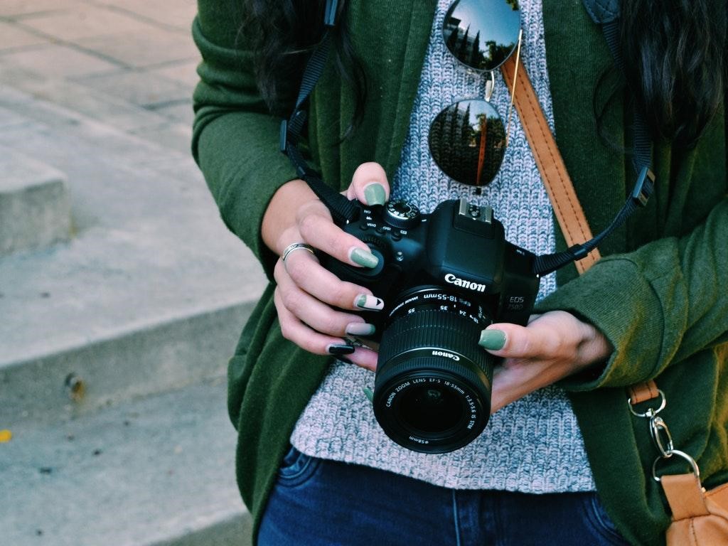 Woman holding camera