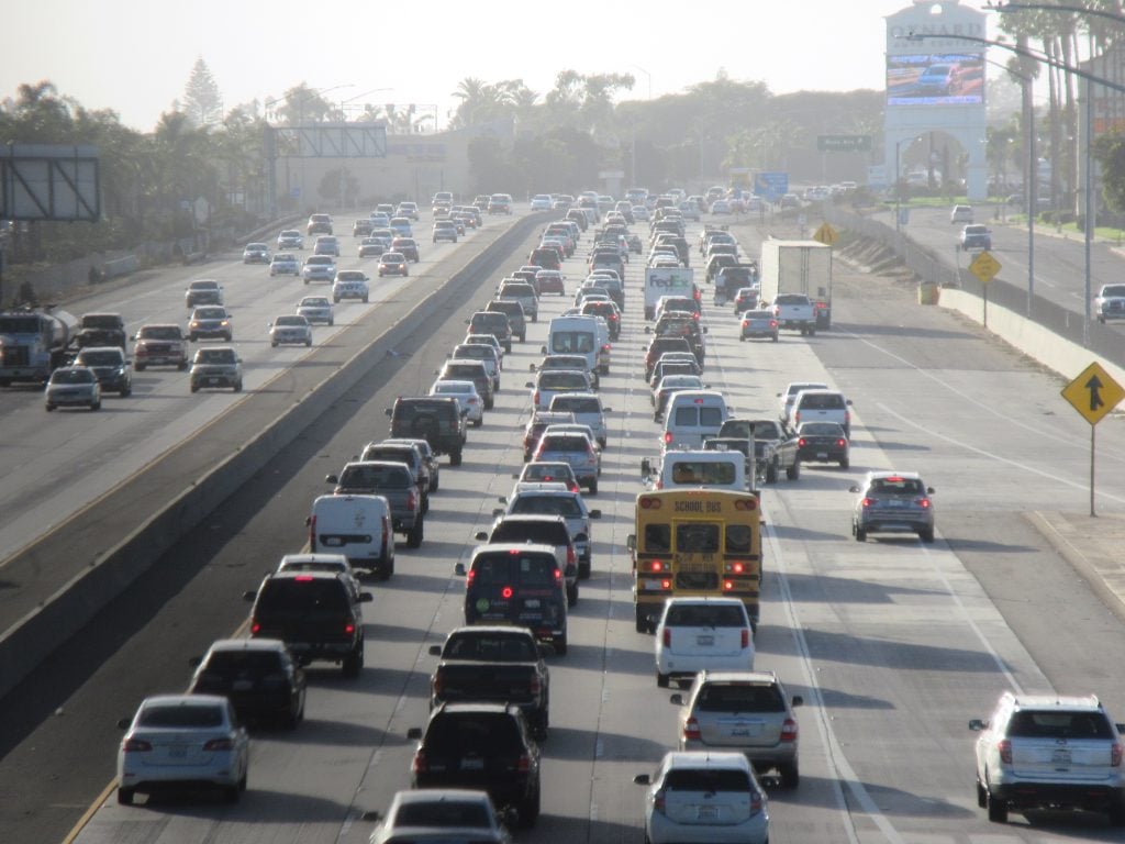 Traffic on the freeway in the smog