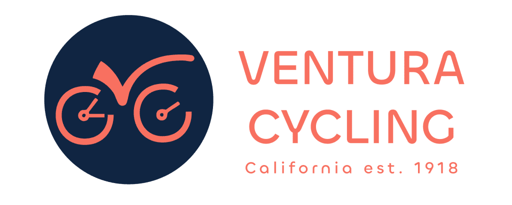 A cyclist riding along Ventura Street in a staging area, California, 2023.